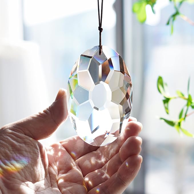 YU FENG 3.5 Inch Oval Crystal Prism Suncatcher, Clear Rainbow Maker | Clear Faceted Crystal Design, Window Hanging Pendant, Sun Catcher Ornament, Natural Light Reflection, Indoor Outdoor Decor