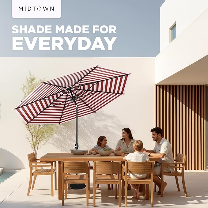 MIDTOWN UMBRELLAS The Lean 9 Feet Outdoor Umbrella With Terylast Red Stripes (Red/White Stripes) Polyester Fabric - 8 Ribs Aluminum Frame Patio Umbrella With Zinc Alloy Crank Lift And Auto-Tilt System