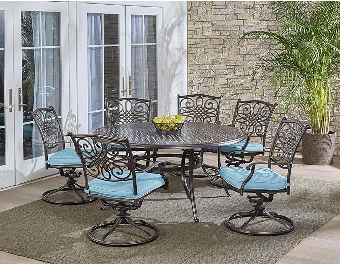 Hanover Traditions 7-Piece Patio Dining Set with 60" Round Cast-Top Table and Swivel Rockers with Blue Cushions, Patio Dining Set for 6, Premium Weather Resistant Outdoor Dining Set