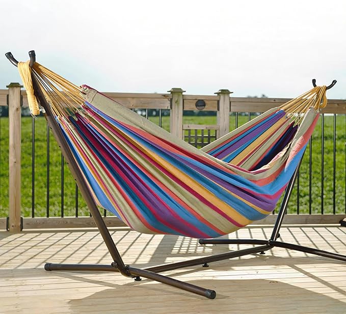 Vivere Double Cotton Hammock with Space Saving Steel Stand, Upgraded Polyester End Strings 450 lb Capacity - Premium Carry Bag Included - (Tropical)