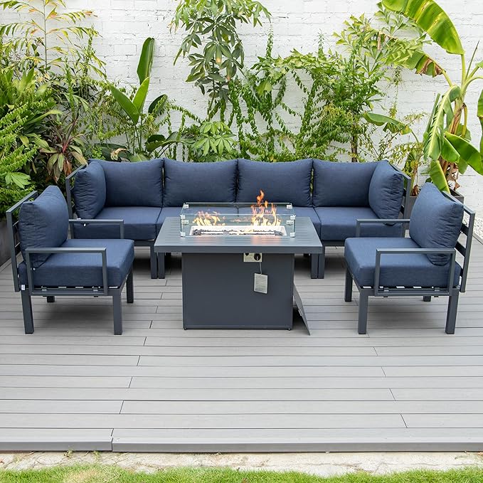 LeisureMod 7-Piece Outdoor Patio Conversation Set with Aluminum Sectional & Cushions, Propane Fire Pit Table with Black Stones, Wind Glass & Lid, Black