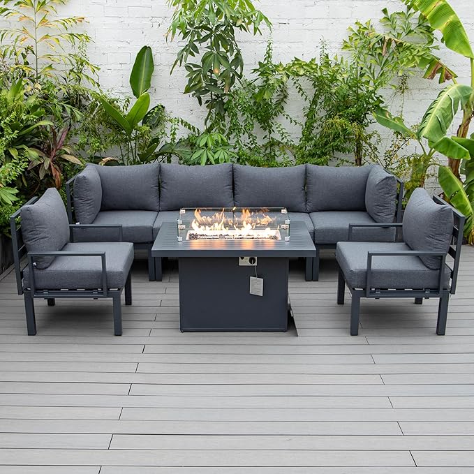 LeisureMod 7-Piece Outdoor Patio Conversation Set with Aluminum Sectional & Cushions, Propane Fire Pit Table with Black Stones, Wind Glass & Lid, Black