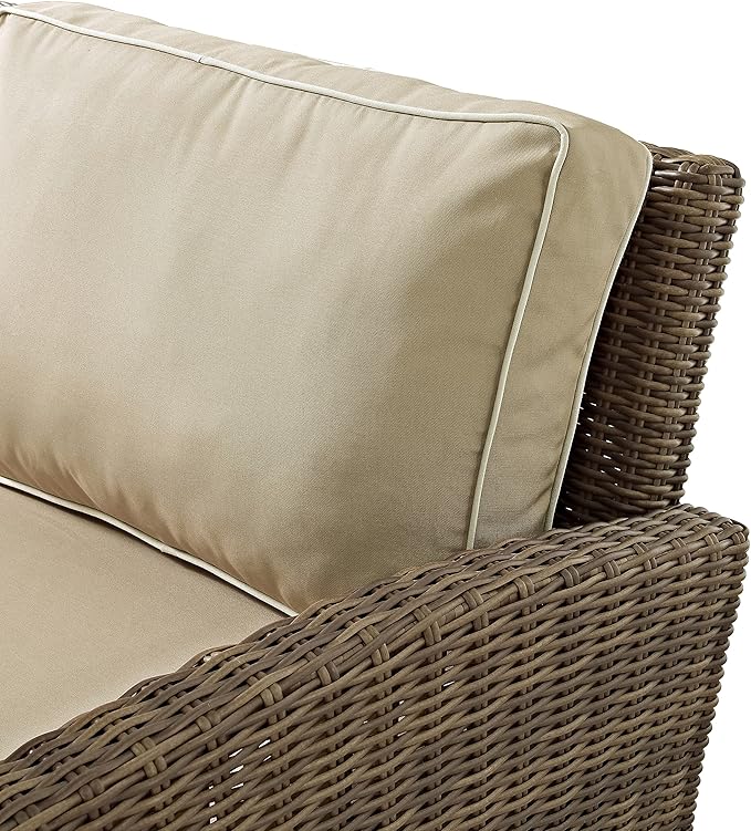 Crosley Furniture Bradenton 2-Piece Outdoor Chair and Ottoman Set, Wicker Patio Conversation Sets for Porch, Brown with Sand Cushions